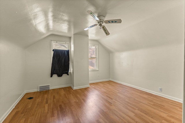 7285 Mansfield St, Detroit, MI 48228 - bonus room with a ceiling fan, vaulted ceiling, wood finished floors, and baseboards