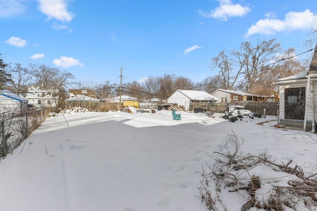 7285 Mansfield St, Detroit, MI 48228 - yard layered in snow featuring a residential view