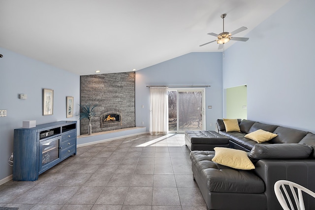 804 E Avon Rd, Rochester Hills, MI 48307 - tiled living room with a ceiling fan, a stone fireplace, high vaulted ceiling, and baseboards