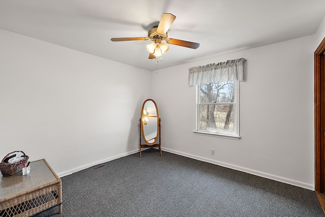 804 E Avon Rd, Rochester Hills, MI 48307 - empty room with ceiling fan, dark colored carpet, and baseboards