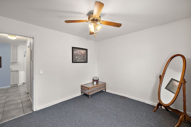 804 E Avon Rd, Rochester Hills, MI 48307 - unfurnished room with ceiling fan, baseboards, and light tile patterned floors