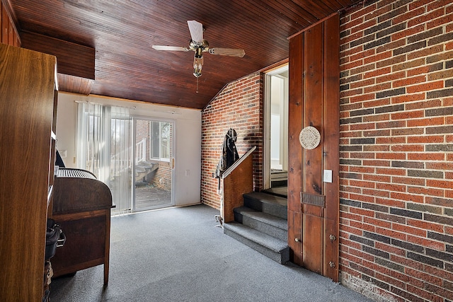 804 E Avon Rd, Rochester Hills, MI 48307 - interior space with wooden ceiling, vaulted ceiling, ceiling fan, stairway, and brick wall