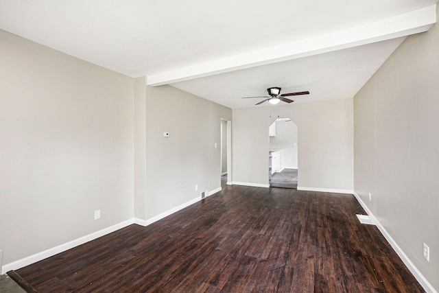 7260 Cadillac Ave, Warren, MI 48091 - empty room featuring a ceiling fan, dark wood-type flooring, baseboards, and arched walkways