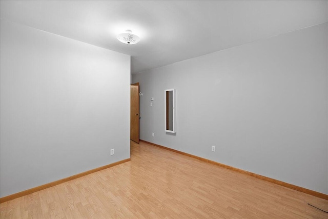 45 E Beech St, Fruitport, MI 49415 - spare room featuring light wood finished floors and baseboards