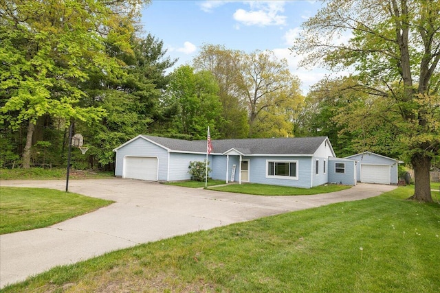 45 E Beech St, Fruitport, MI 49415 - ranch-style house featuring a front lawn, view of scattered trees, a garage, and an outdoor structure