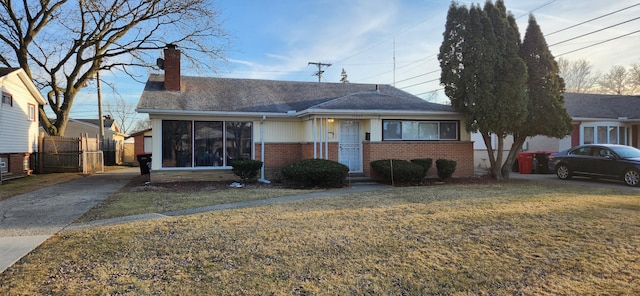 15939 New Hampshire St, Southfield, MI 48075 - view of front of property featuring brick siding, a chimney, and roof with shingles