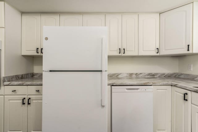 15939 New Hampshire St, Southfield, MI 48075 - kitchen featuring white appliances, white cabinets, and light countertops
