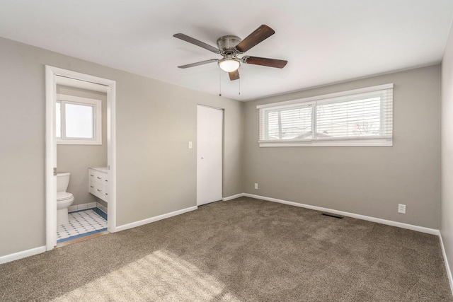 15939 New Hampshire St, Southfield, MI 48075 - unfurnished bedroom with multiple windows, carpet floors, and ensuite bathroom