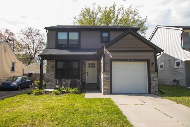 1226 E Bernhard Ave, Hazel Park, MI 48030 - view of front facade featuring stone siding and driveway