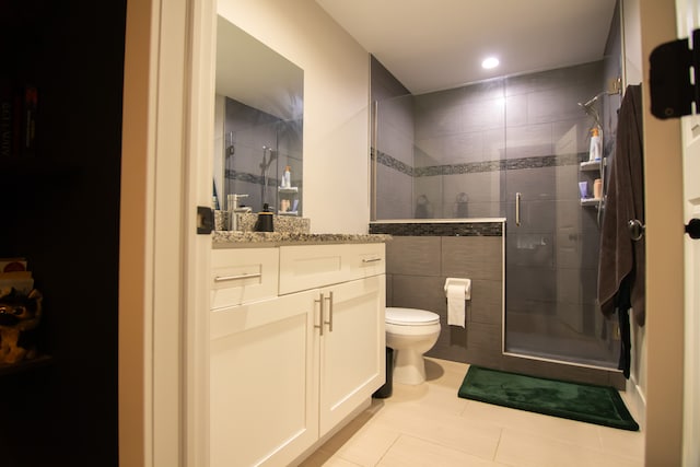 1226 E Bernhard Ave, Hazel Park, MI 48030 - full bathroom with tile patterned flooring, a shower stall, toilet, vanity, and recessed lighting