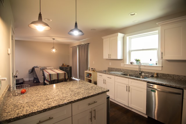 1226 E Bernhard Ave, Hazel Park, MI 48030 - kitchen with dishwasher, a sink, white cabinetry, dark stone countertops, and pendant lighting