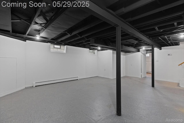 24371 Grove Ave, Eastpointe, MI 48021 - below grade area with a baseboard heating unit and baseboards