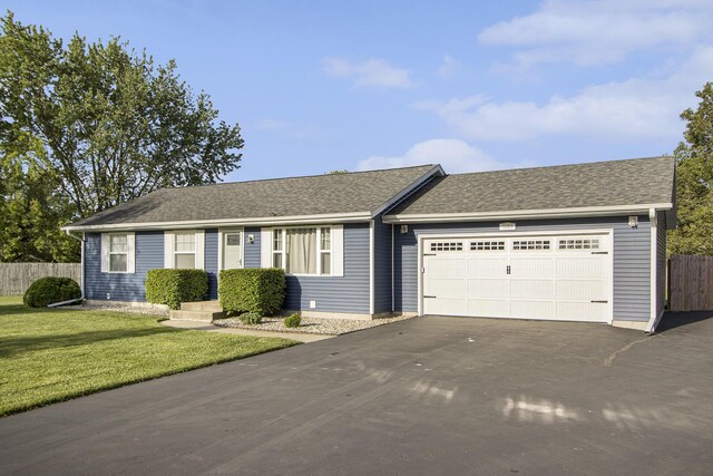 5550 Newhaven Cv, Portage, MI 49024 - ranch-style home featuring driveway and an attached garage