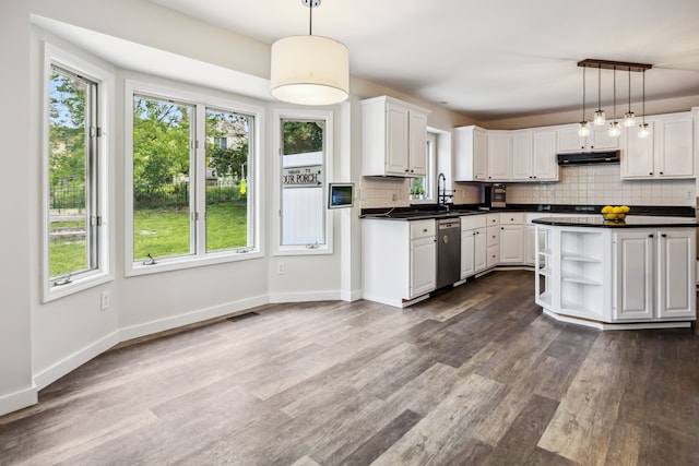 8148 Orchardview Dr, Washington, MI 48095 - kitchen featuring stainless steel dishwasher, dark countertops, open shelves, and white cabinetry