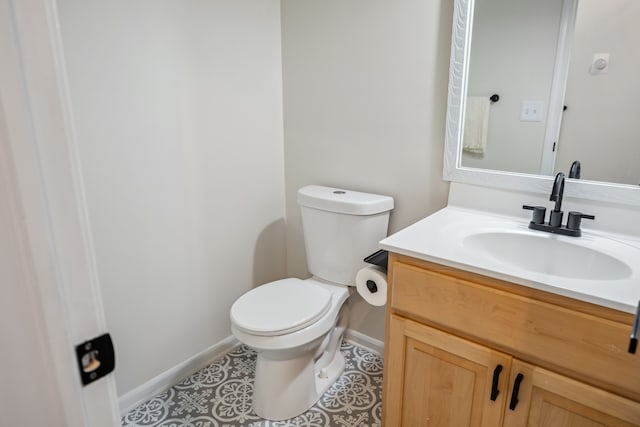 8148 Orchardview Dr, Washington, MI 48095 - bathroom with baseboards, toilet, and vanity