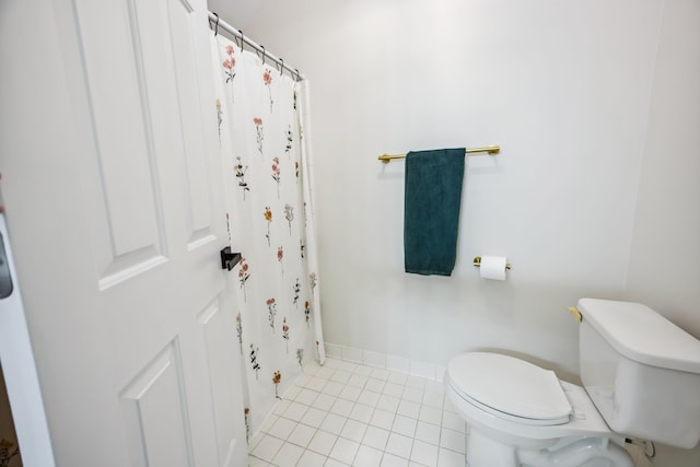 8148 Orchardview Dr, Washington, MI 48095 - full bathroom with toilet, tile patterned floors, a shower with shower curtain, and baseboards