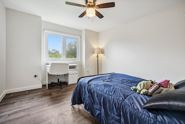 8148 Orchardview Dr, Washington, MI 48095 - bedroom with wood finished floors, baseboards, and ceiling fan