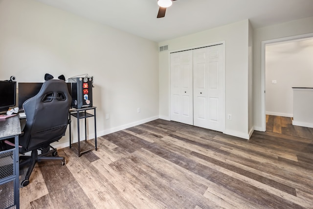 8148 Orchardview Dr, Washington, MI 48095 - office featuring a ceiling fan, wood finished floors, and baseboards