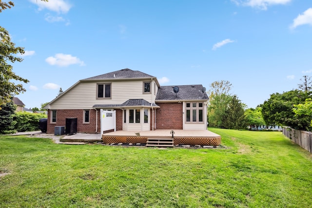 8148 Orchardview Dr, Washington, MI 48095 - back of house with brick siding, central air condition unit, a wooden deck, and a shingled roof