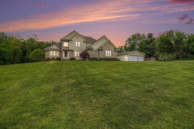 4024 Hosner Rd, Metamora, MI 48455 - view of front of property featuring a detached garage, an outdoor structure, a lawn, and stone siding