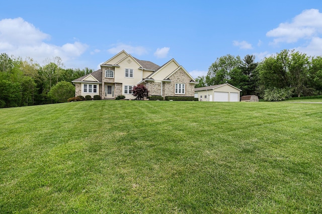 4024 Hosner Rd, Metamora, MI 48455 - view of front of property with an outdoor structure, a garage, a front lawn, and brick siding