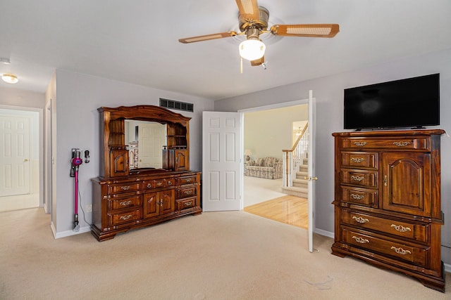 4024 Hosner Rd, Metamora, MI 48455 - bedroom with carpet, baseboards, and a ceiling fan