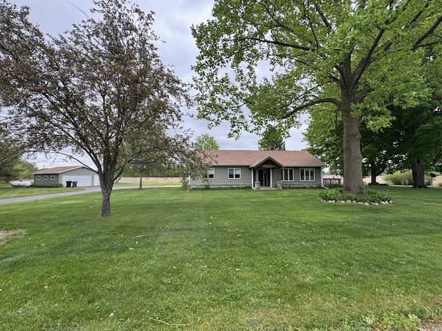 365 Prairiewood Dr, Otsego, MI 49078 - ranch-style home featuring a front lawn and a garage