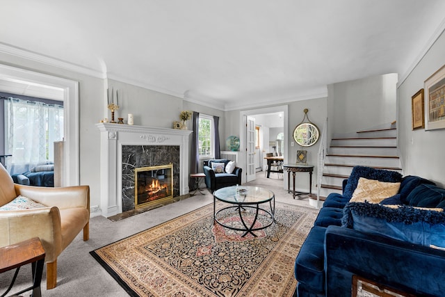 8911 Manor Ave, Allen Park, MI 48101 - living room with a premium fireplace, carpet floors, stairs, crown molding, and baseboards