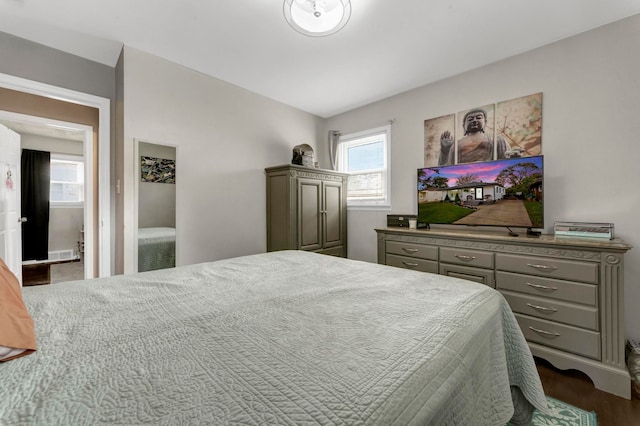23830 Shakespeare Ave, Eastpointe, MI 48021 - bedroom with dark wood-style floors