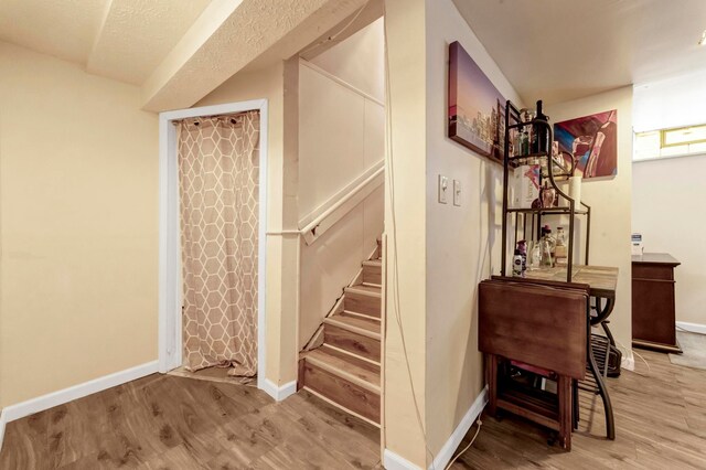 23830 Shakespeare Ave, Eastpointe, MI 48021 - stairs featuring wood finished floors and baseboards