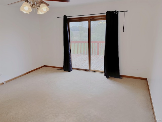 9421 Springville Hwy, Onsted, MI 49265 - empty room with a ceiling fan, carpet floors, and baseboards