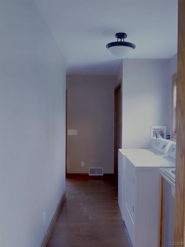 9421 Springville Hwy, Onsted, MI 49265 - laundry room featuring wood finished floors, baseboards, and washer and clothes dryer