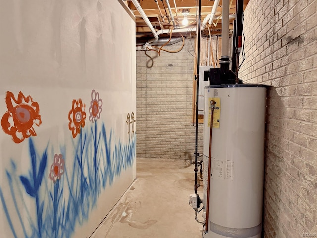 9421 Springville Hwy, Onsted, MI 49265 - unfinished below grade area with water heater and brick wall