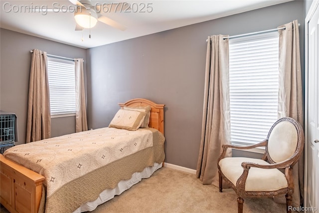 791 Glen Meadows Dr, South Lyon, MI 48178 - bedroom with light carpet, baseboards, and ceiling fan