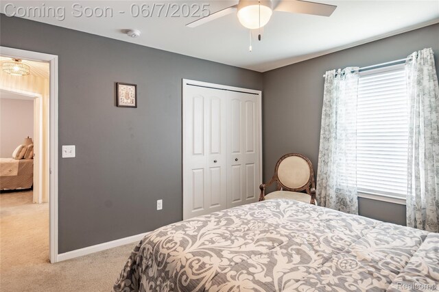 791 Glen Meadows Dr, South Lyon, MI 48178 - carpeted bedroom with a closet, multiple windows, a ceiling fan, and baseboards