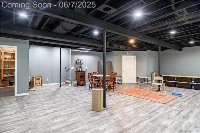 791 Glen Meadows Dr, South Lyon, MI 48178 - finished below grade area featuring wood finished floors and baseboards