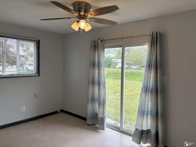 12642 Kentfield St, Detroit, MI 48223 - empty room with a ceiling fan and baseboards