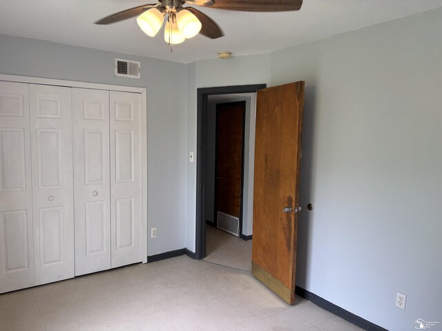 12642 Kentfield St, Detroit, MI 48223 - unfurnished bedroom with a closet, baseboards, and ceiling fan