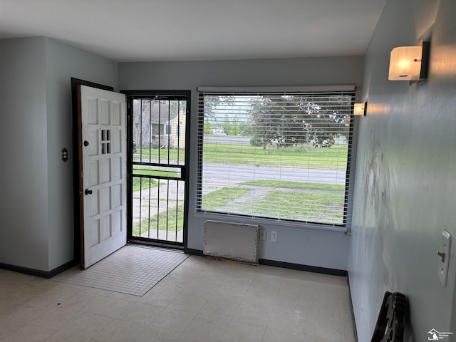 12642 Kentfield St, Detroit, MI 48223 - foyer entrance with baseboards and plenty of natural light