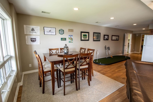 13496 S Horrell Rd, Fenton, MI 48430 - dining area featuring recessed lighting, wood finished floors, and baseboards