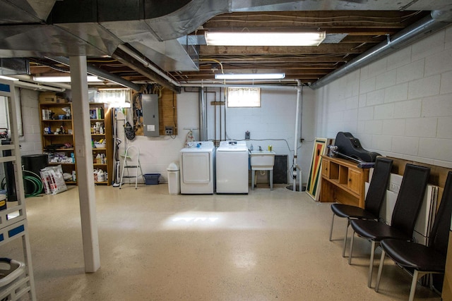 13496 S Horrell Rd, Fenton, MI 48430 - basement with electric panel, separate washer and dryer, concrete block wall, and a sink