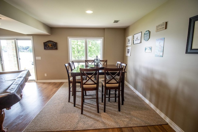 13496 S Horrell Rd, Fenton, MI 48430 - dining room featuring wood finished floors, baseboards, and recessed lighting