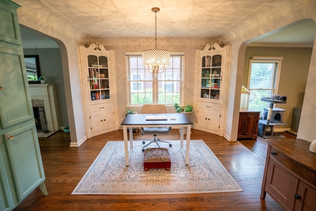2366 Grange Rd, Trenton, MI 48183 - office featuring arched walkways, dark wood-style floors, baseboards, and crown molding