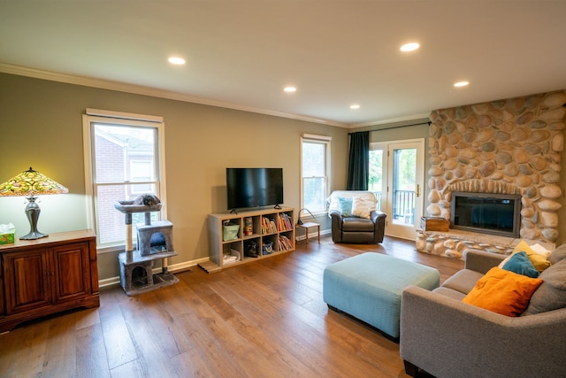 2366 Grange Rd, Trenton, MI 48183 - living room with crown molding, hardwood / wood-style flooring, recessed lighting, a fireplace, and baseboards