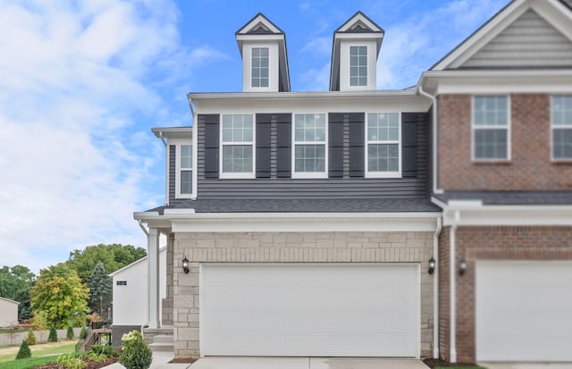 4082 Nottingham Cir, Clarkston, MI 48346 - view of front of property with a garage, driveway, and stone siding