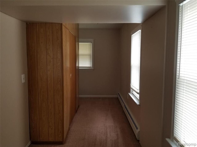 7267 William St, Taylor, MI 48180 - hall with a baseboard heating unit, carpet floors, and baseboards
