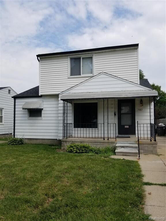7267 William St, Taylor, MI 48180 - view of front of property featuring a porch and a front yard