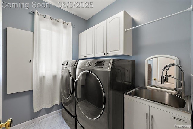 53629 Wayburn Ct, Utica, MI 48315 - laundry room featuring cabinet space, independent washer and dryer, and marble finish flooring