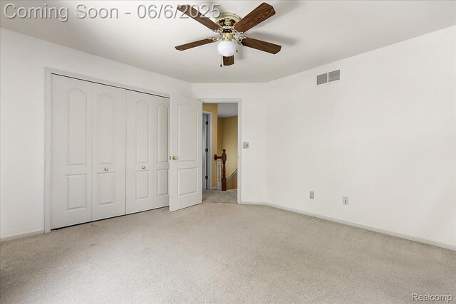53629 Wayburn Ct, Utica, MI 48315 - unfurnished bedroom featuring carpet, baseboards, a closet, and ceiling fan