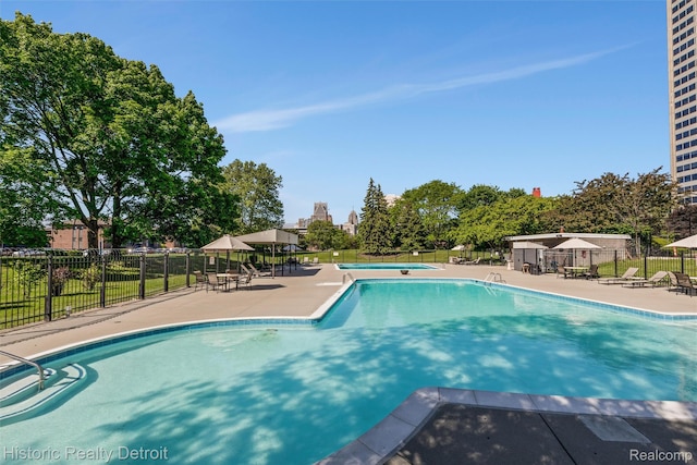 1300 E Lafayette St Unit 1604, Detroit, MI 48207 - community pool featuring a patio area